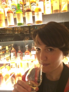 A photo of the author sipping whisky while admiring The Diageo Claive Vidiz Collection in Edinburgh.